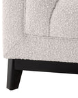 Fauteuil Ditmar bouclé crème